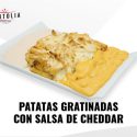 Patatas Gratinadas con salsa Cheddar